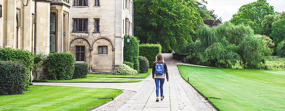 photo of someone walking outside Kings College at the University of Cambridge by Victoria Heath via unsplash